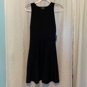 Sleeveless sweater dress new with tags.  Stretchy material.